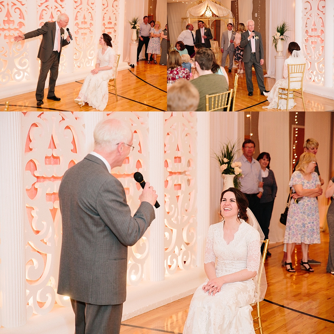bride sitting down while father sings to her and dances with her