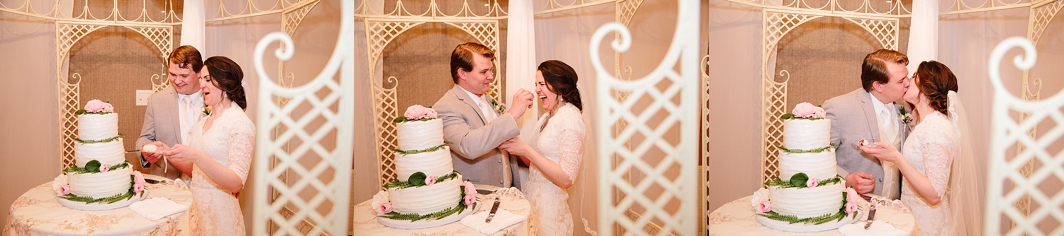 bride and groom cutting wedding cake during romantic idaho falls wedding