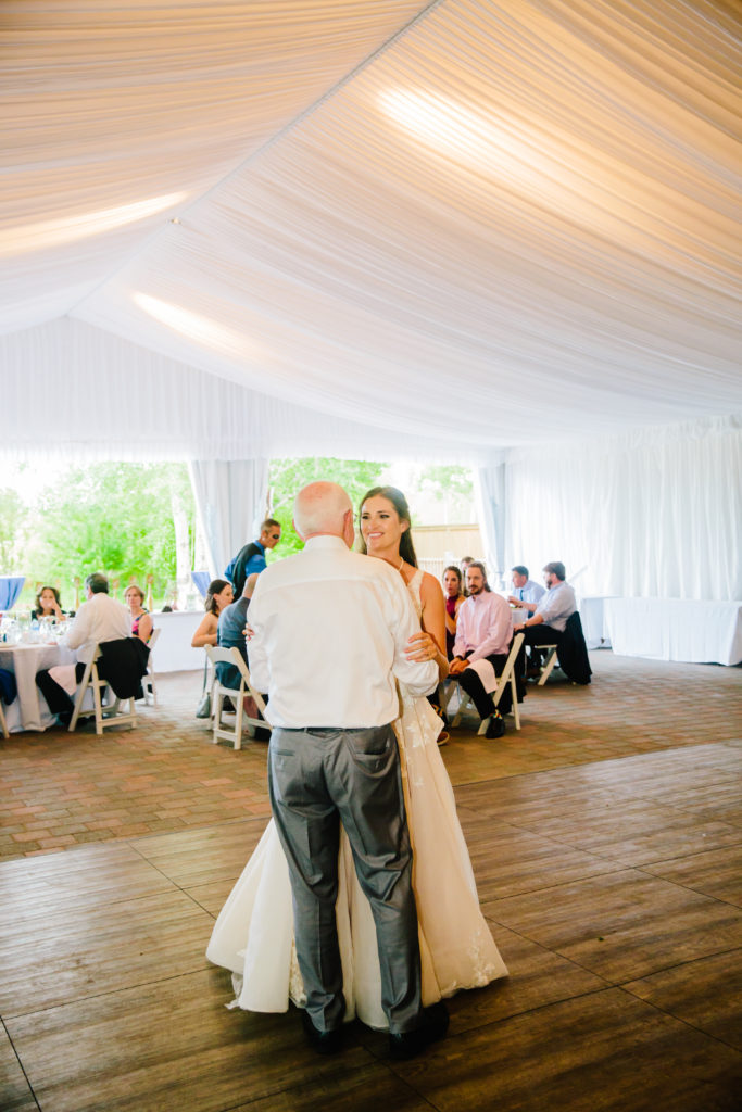 bride dancing with father on wedding day at top jackson hole wedding venue