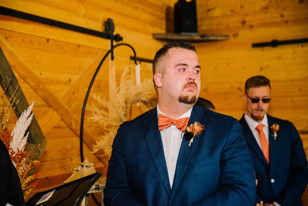 Groom crying when he sees the bride