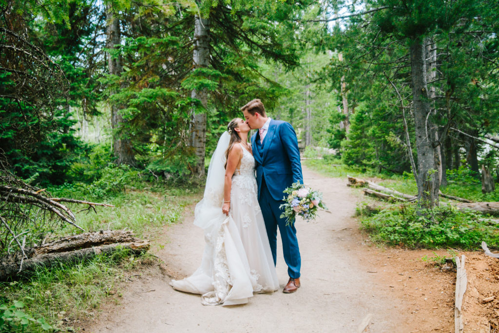 bride and groom kissing in grand teton national park bridals