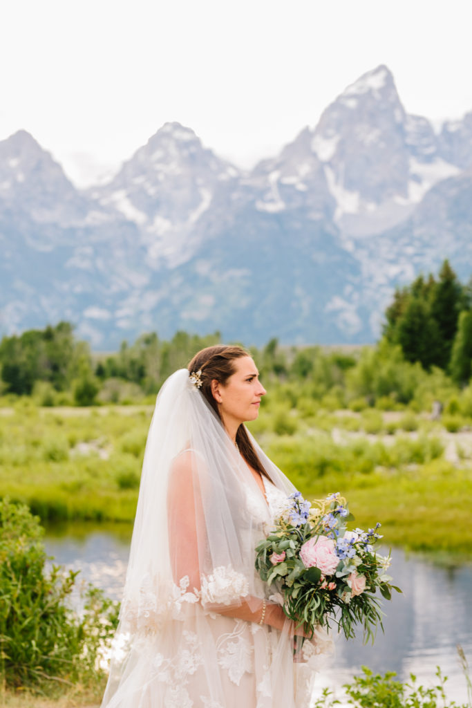 bride looking off into distance during spring jackson hole bridals