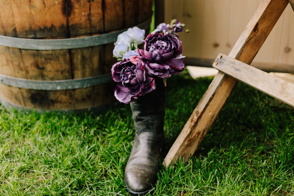 cowboy boot with purple florals for rustic chic wedding inspiration