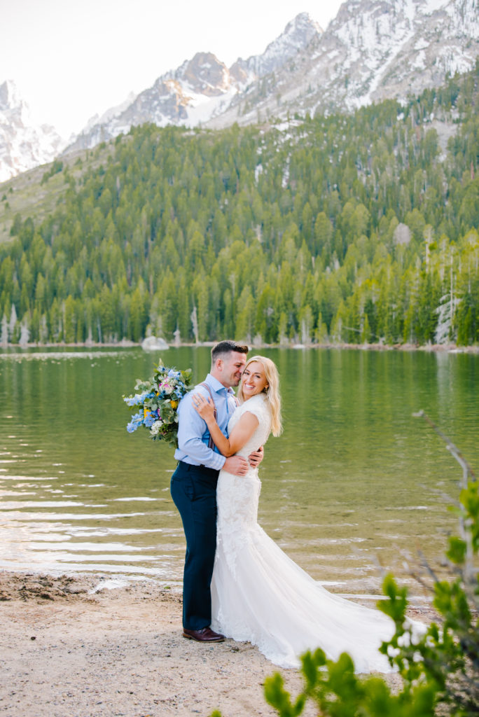 bride and groom at string lake during jackson hole vow renewal