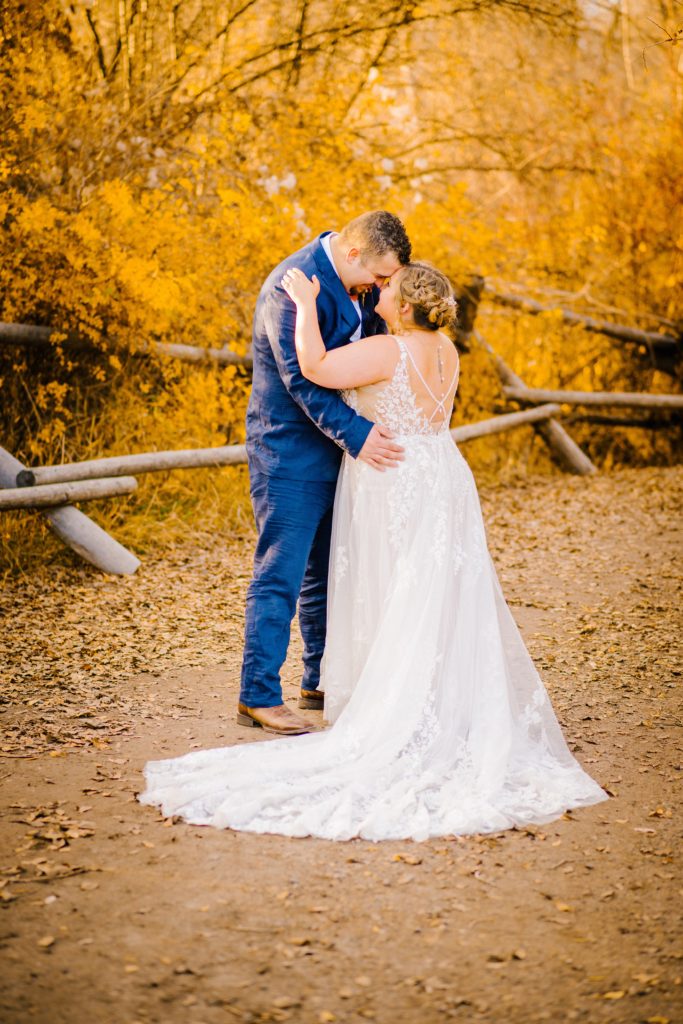 Jackson Hole wedding photographer captures Bride and groom at fall wedding