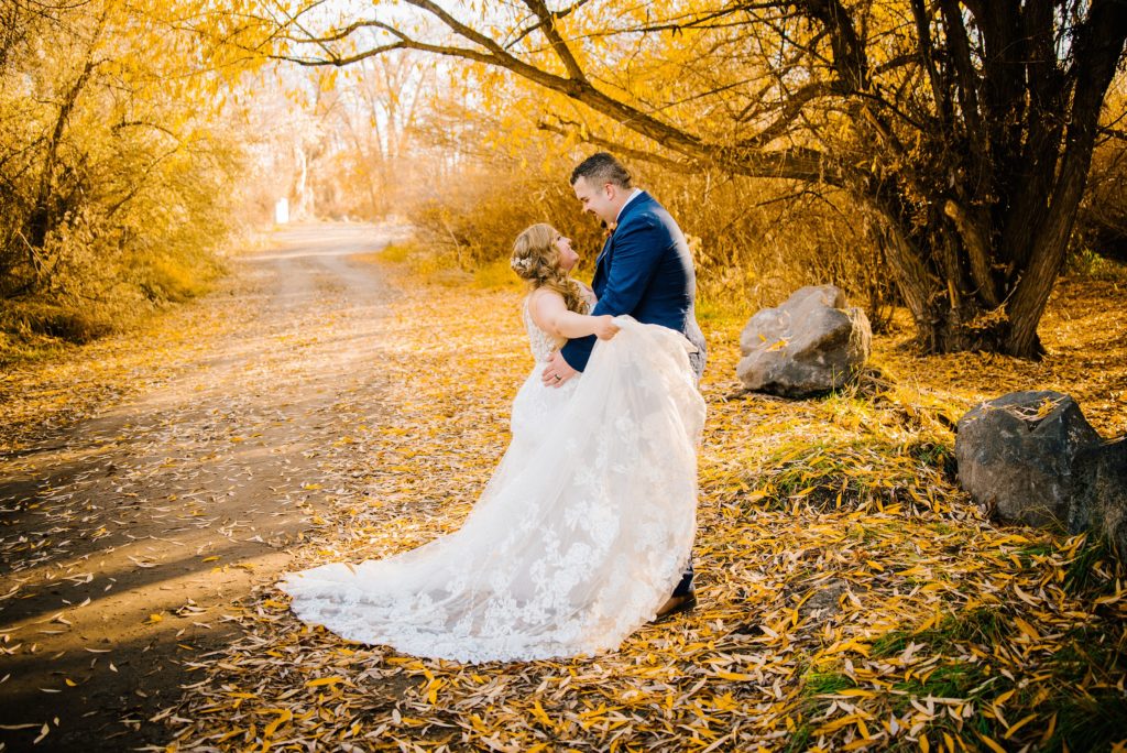 Jackson Hole wedding photographer captures bride spinning dress around