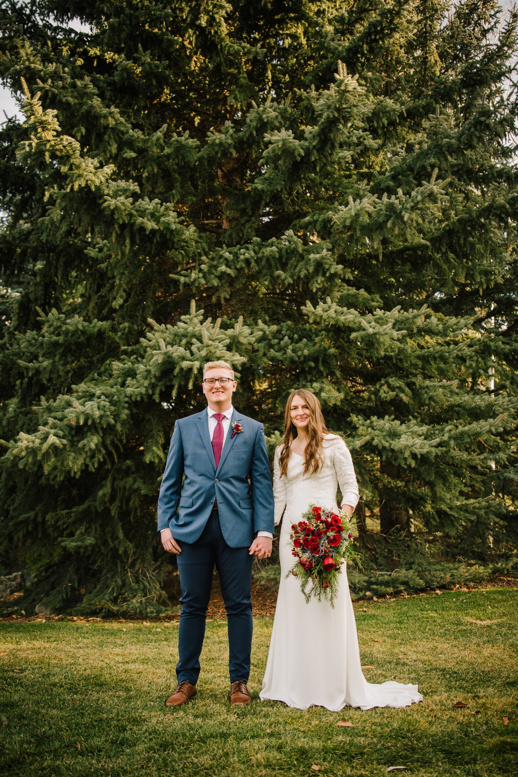 fall wedding in the woods with floral bouquet