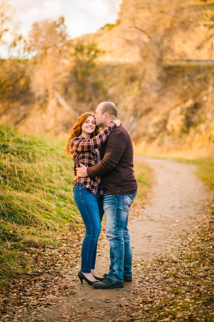 Jackson Hole wedding photographer captures couple kissing during outdoor engagement session