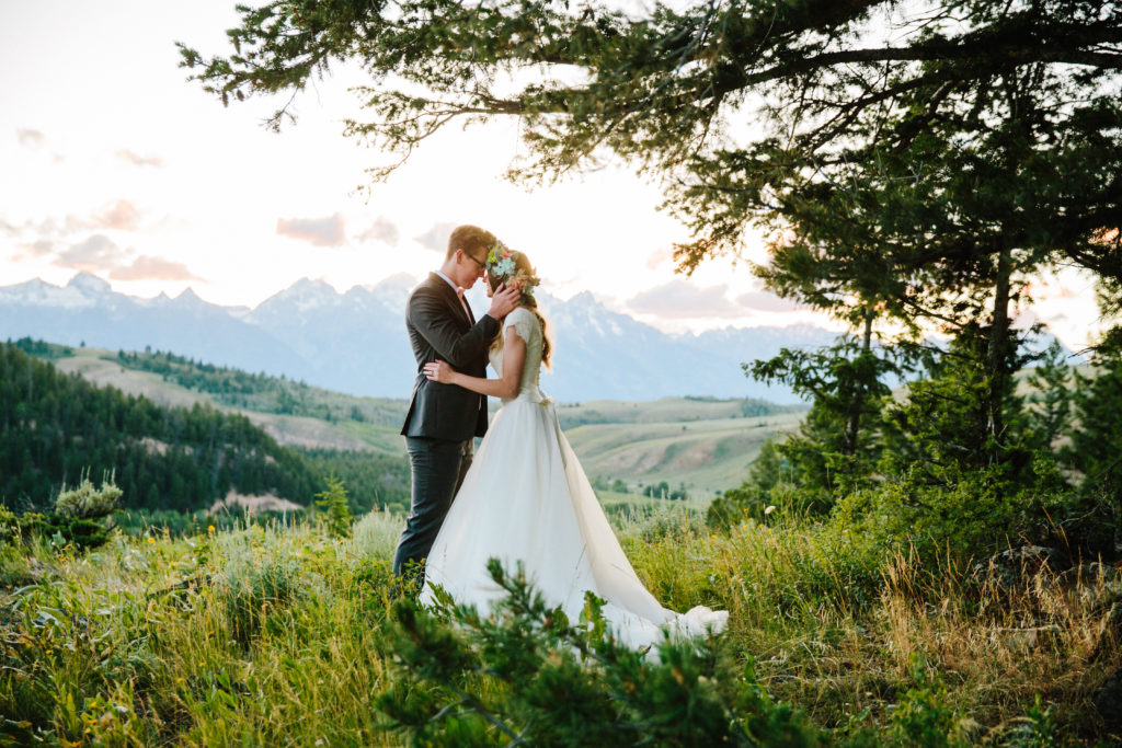 Couple eloping in mountains outlook