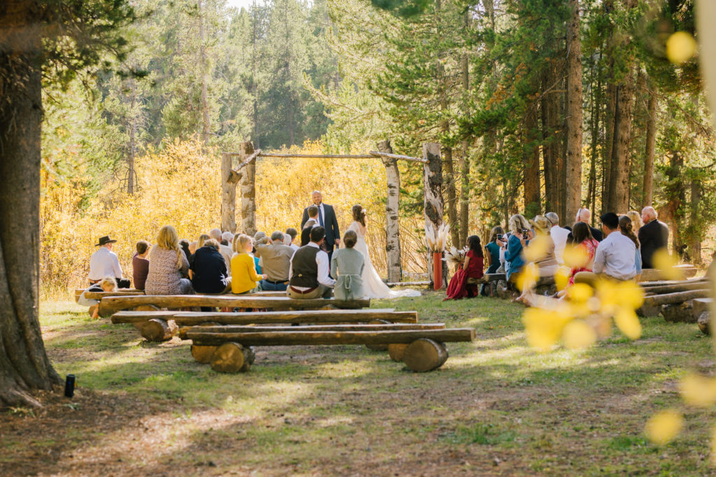 Jackson Hole wedding photographer captures Ceremony at island Park eagle ridge ranch