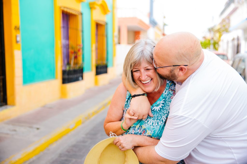 Jackson Hole wedding photographer captures couple kissing in the streets in Mazatlan 