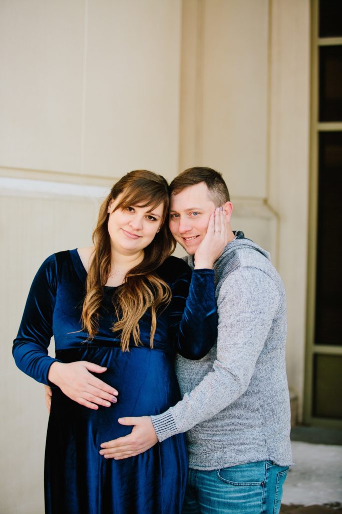 Jackson Hole wedding photographer captures husband and wife with baby bump