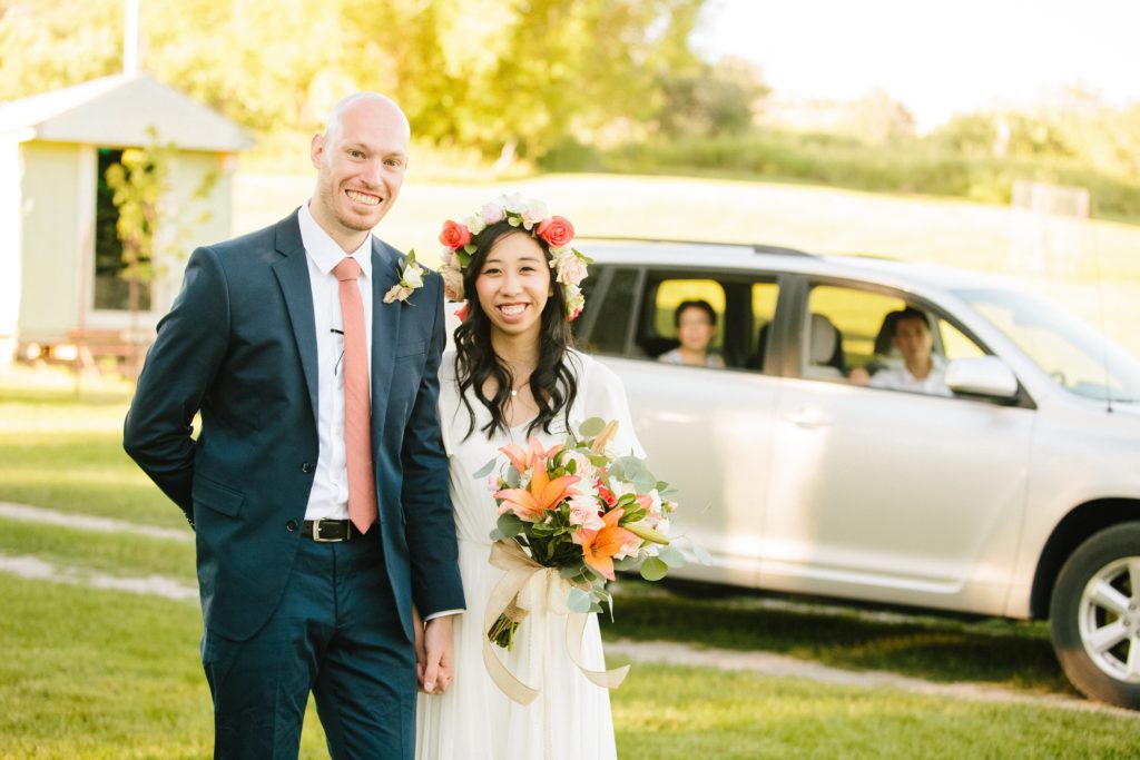 Jackson Hole wedding photographer captures Parents watch from car as daughter gets married in pocatello idaho