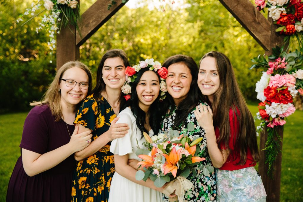 Jackson Hole wedding photographer captures Bride and friends pose for photos