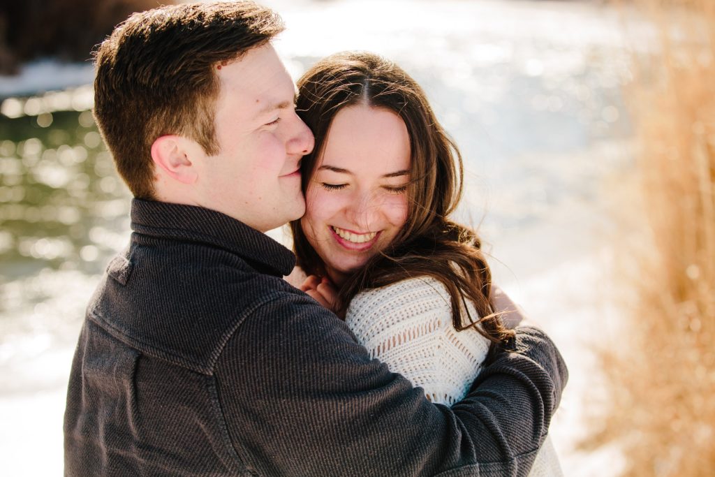 Jackson Hole wedding photographer captures man and woman embracing and laughing