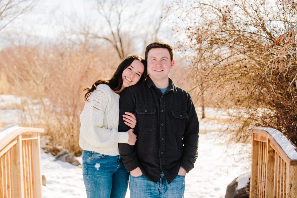 Jackson Hole wedding photographer captures woman hugging man's arm