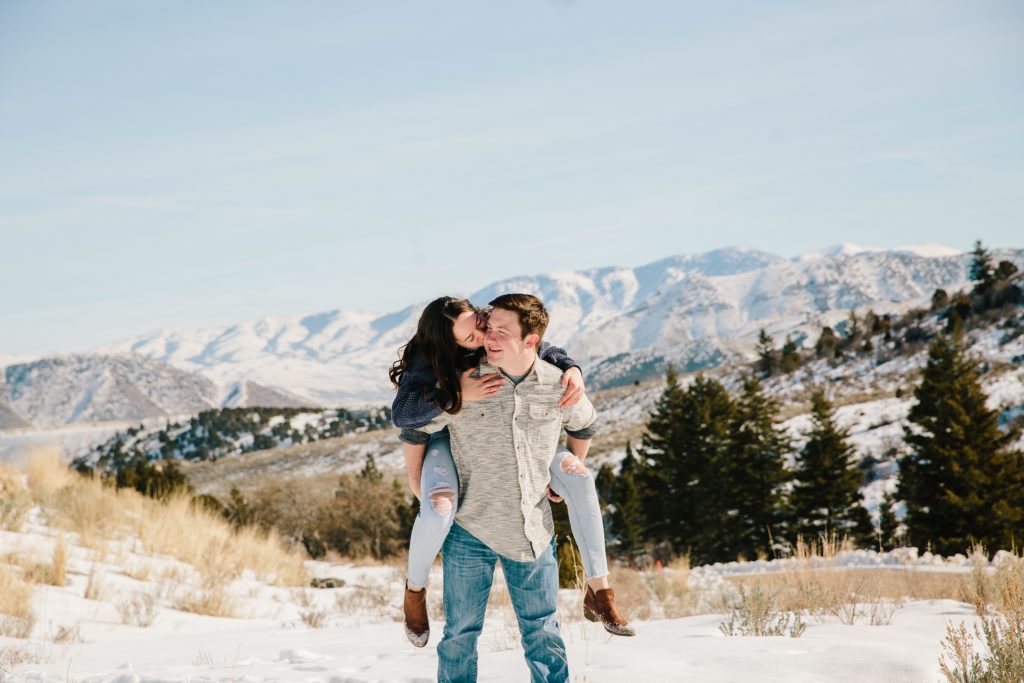 Jackson Hole wedding photographer captures couple Kissing in the mountains during Idaho engagements