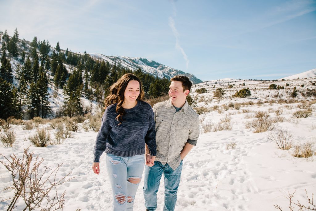 Jackson Hole wedding photographer captures couple laughing during idaho engagements