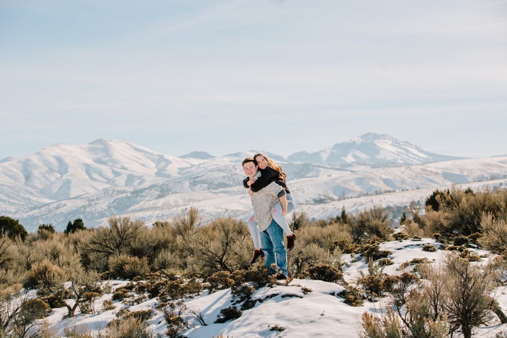 Jackson Hole wedding photographer captures piggy back couples