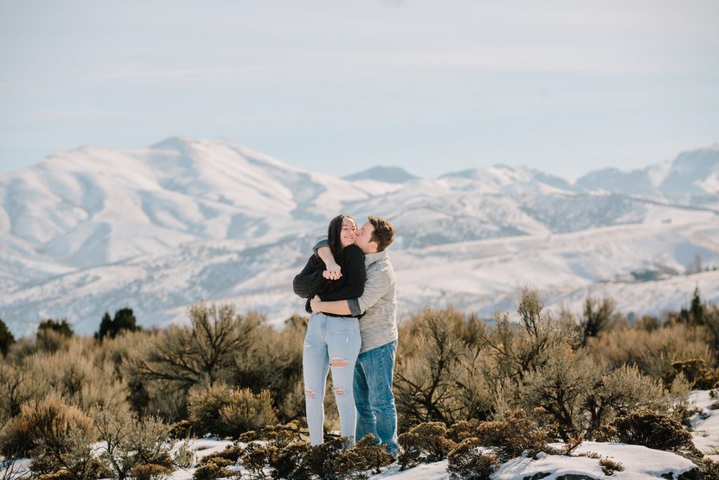 Jackson Hole wedding photographer captures couple wrapping arms around one another