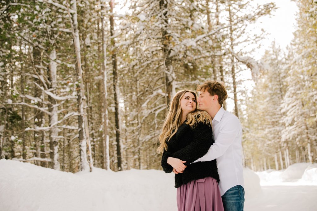 Jackson Hole wedding photographer captures couple laughing and hugging