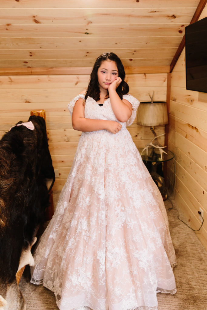 Jackson Hole wedding photographer captures daughter wearing mothers wedding dress 