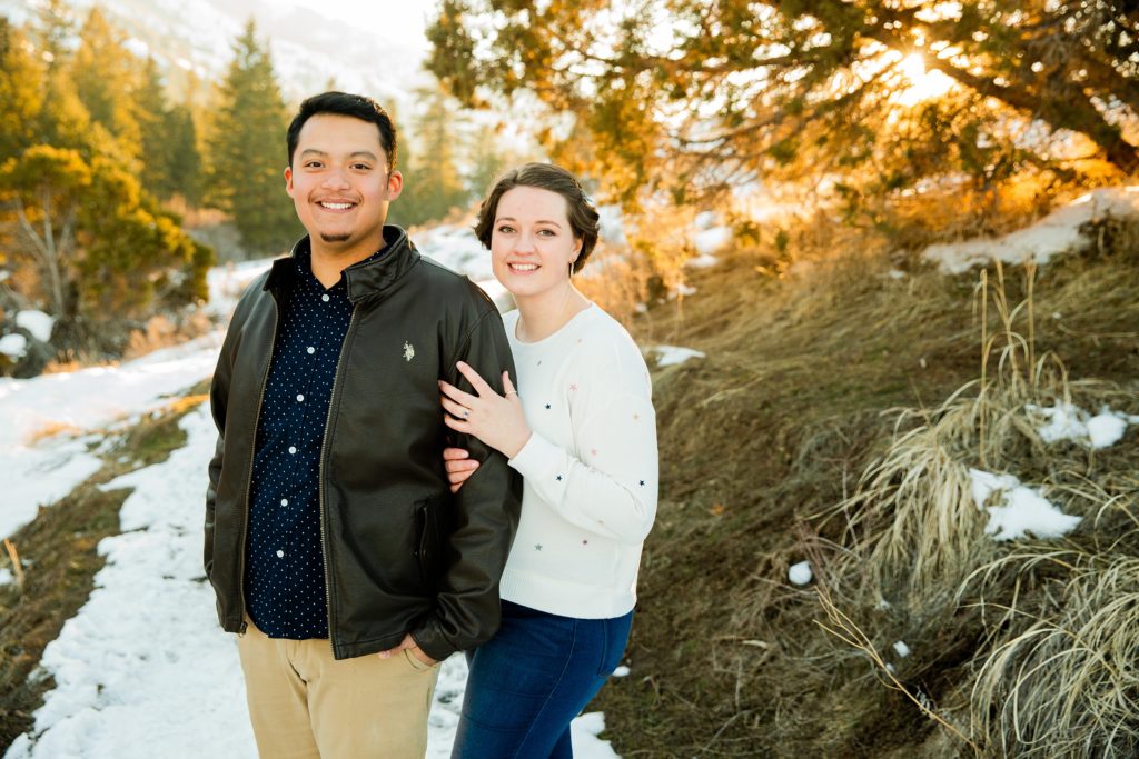 Jackson Hole wedding photographer captures Gibson Gack pocatello sunset engagement photos couple smiling at camera