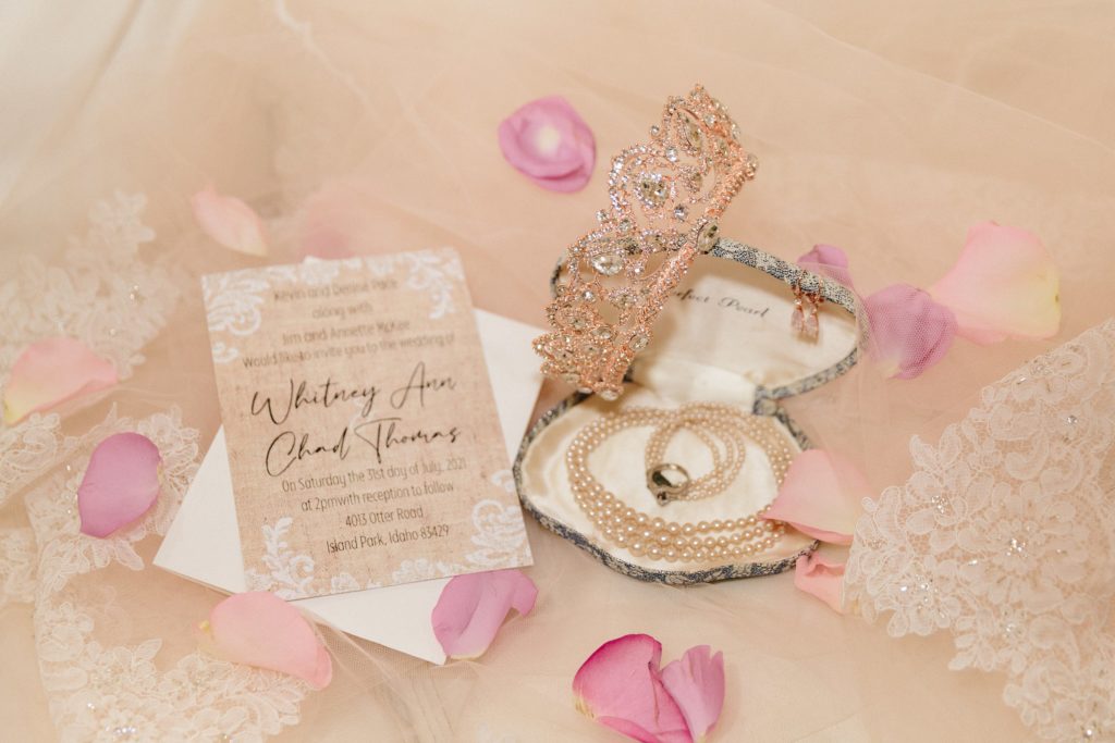 wedding details with crown and jewelry for island park wedding