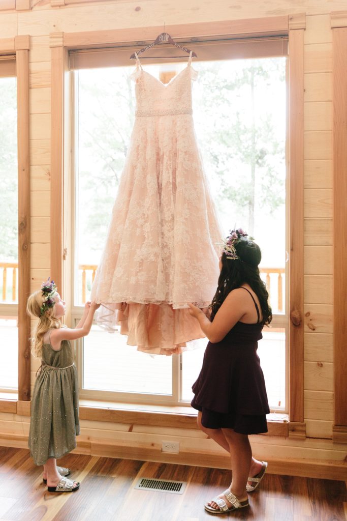 Jackson Hole wedding photographer captures daughters with mothers wedding dress