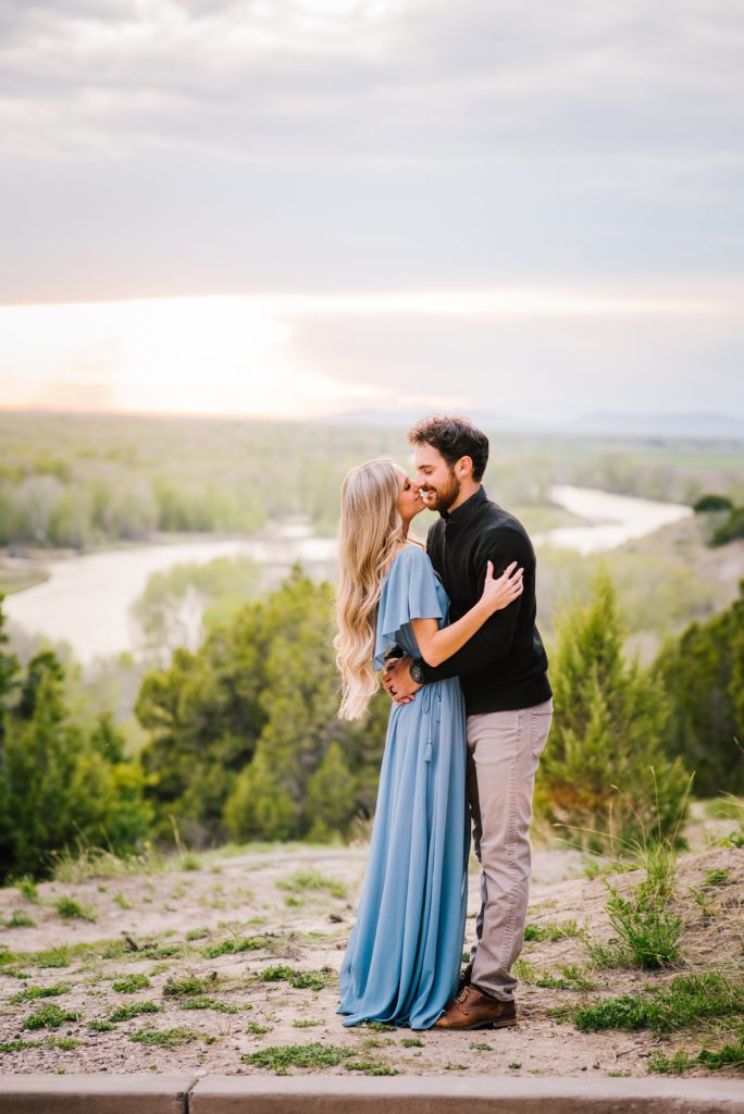 Jackson Hole wedding photographer captures kissing in the river 