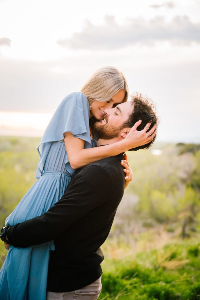 Jackson Hole wedding photographer captures notebook kiss in mountains