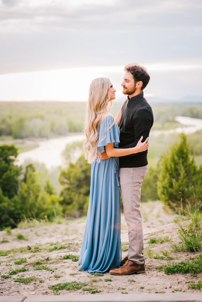 Jackson Hole wedding photographer captures Couple gaze into each others eyes at sunset 