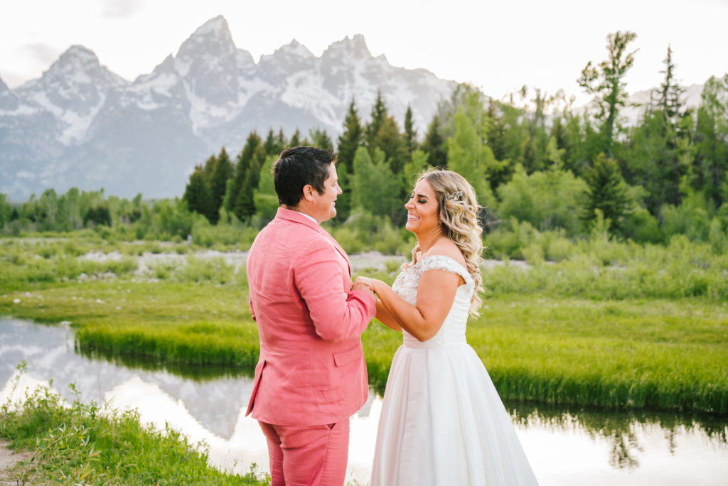 Jackson Hole wedding photographer captures bride and groom getting married in grand teton national park