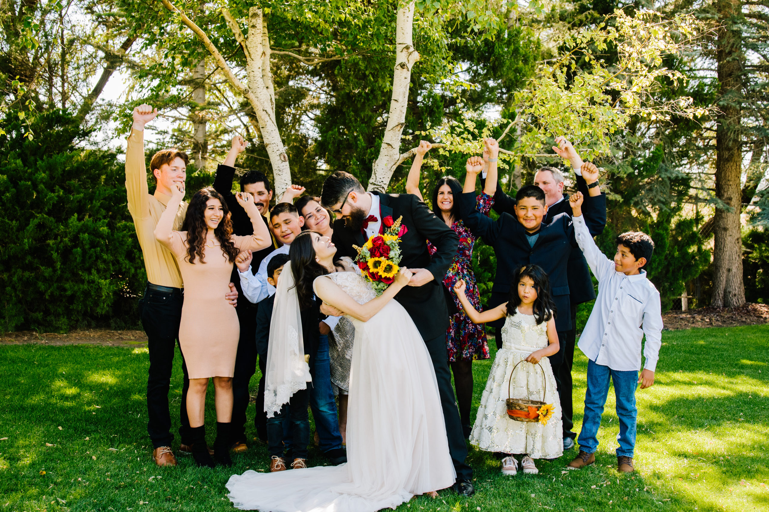 Jackson Hole wedding photographer captures backyard idaho wedding with couple celebrating