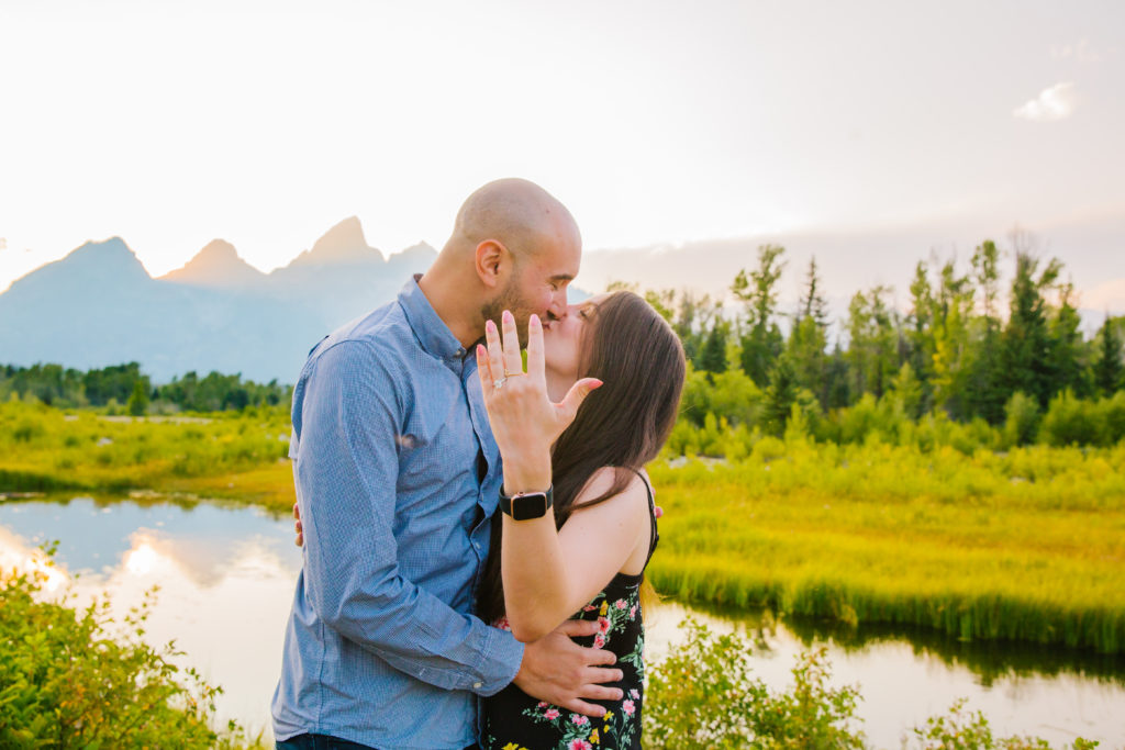 newly engaged couple kissing during national park engagements