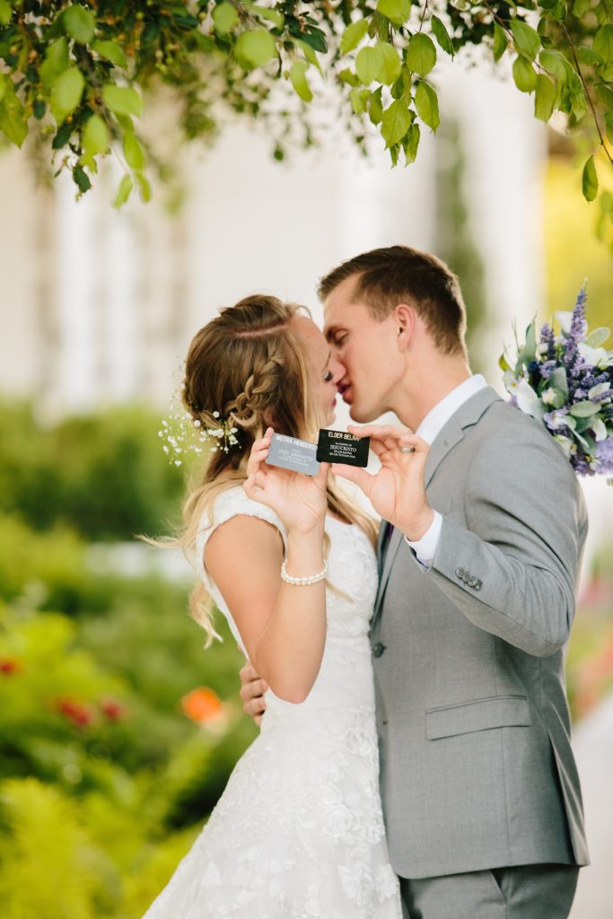 Jackson Hole wedding photographer captures Bride and groom with missionary tags lds wedding