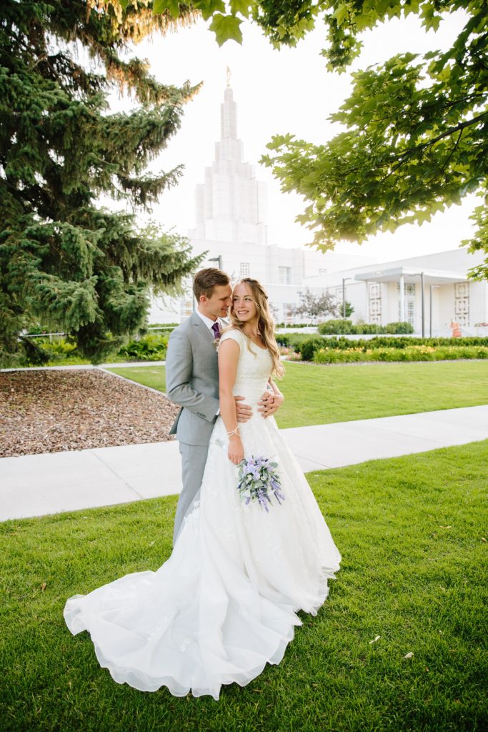Jackson Hole wedding photographer captures beautiful idaho falls wedding bride and groom lds temple summer