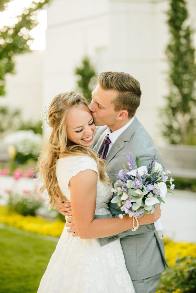 Jackson Hole wedding photographer captures bride laughing and in love beautiful idaho falls wedding