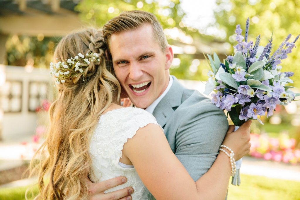Jackson Hole wedding photographer captures groom happy to see bride