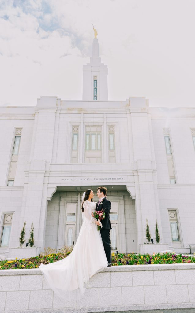 bride and groom with early spring bright pocatello temple bridals pocatello wedding photographer
