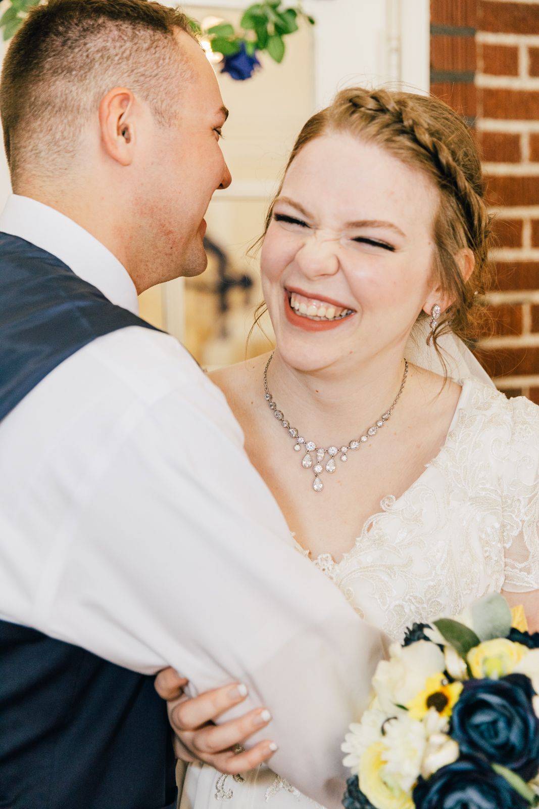 Jackson Hole wedding photographer captures bride and groom laughing pocatello wedding