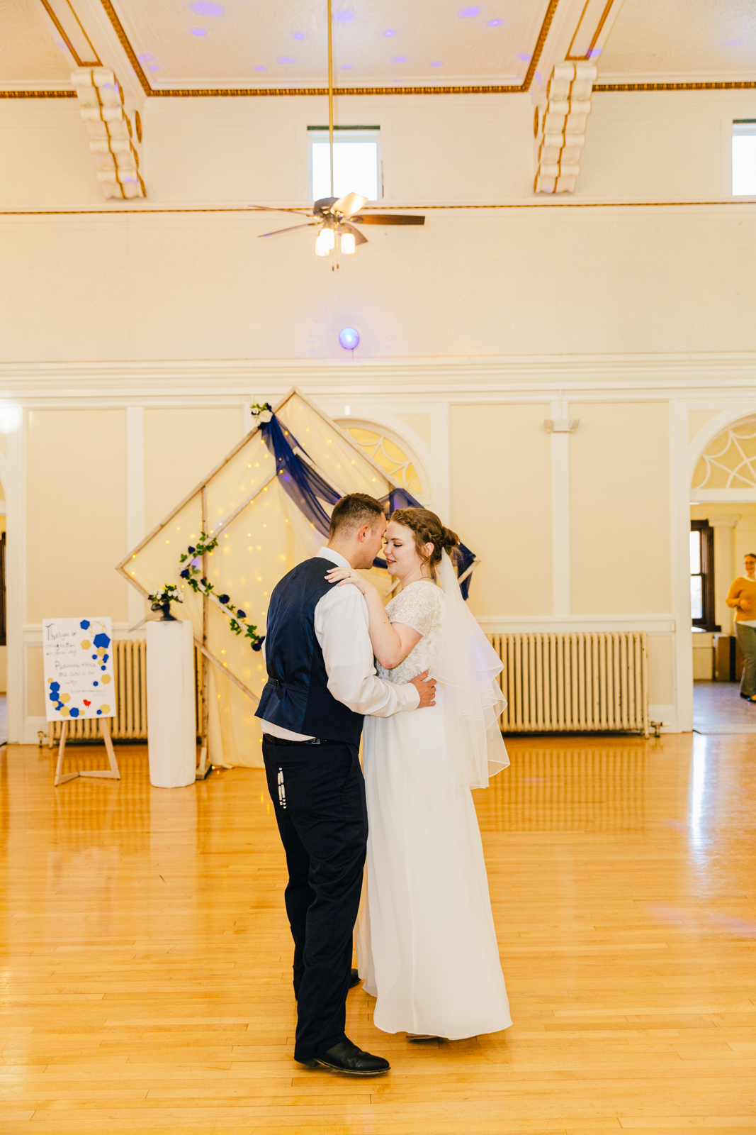Jackson Hole wedding photographer captures bride and groom dancing at ballroom pocatello wedding venue