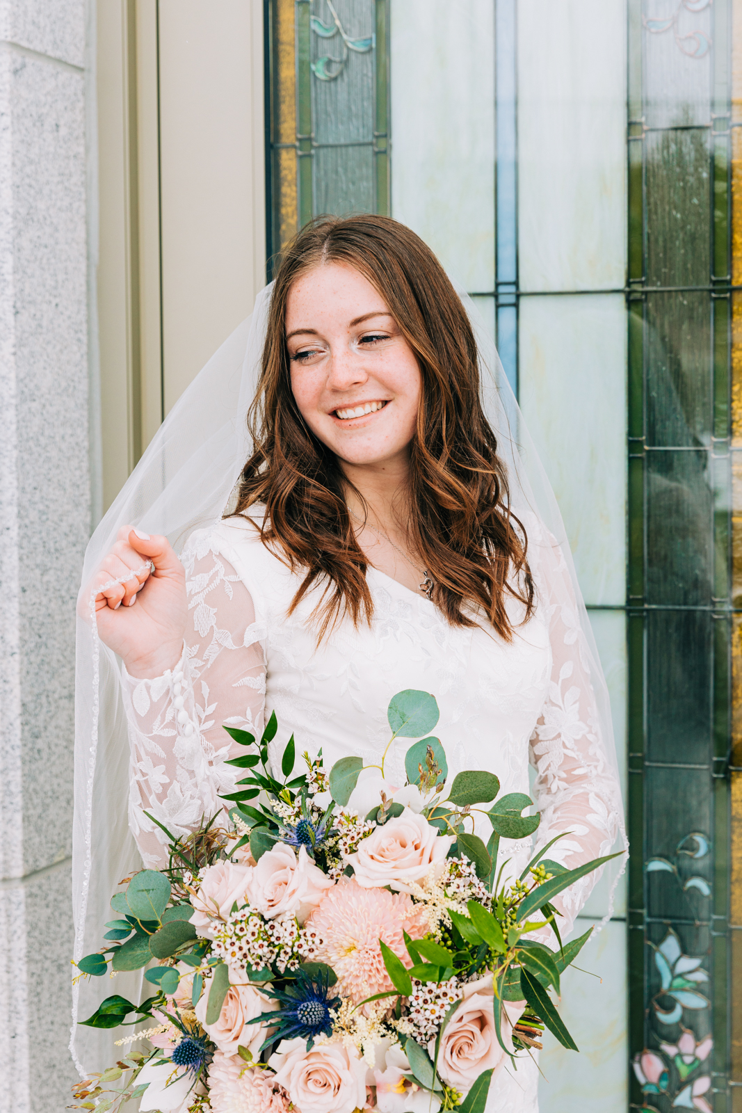 Jackson Hole wedding photographer captures margeenes dress pocatello weddi g