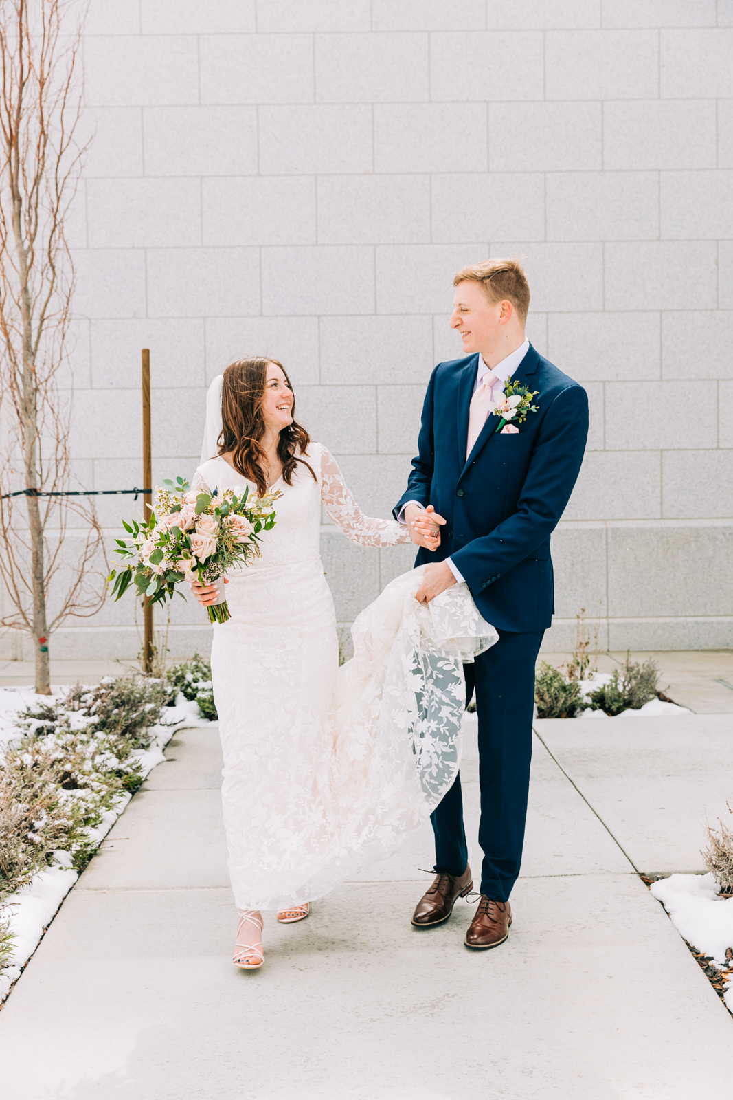 Jackson Hole wedding photographer captures groom helping bride