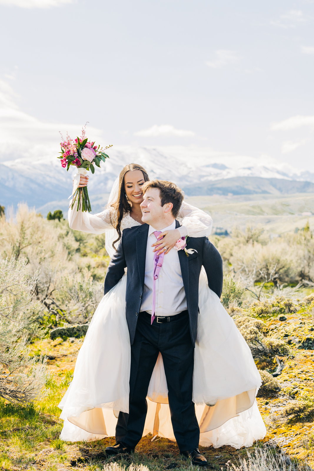Jackson Hole wedding photographer captures bride and groom celebrating 