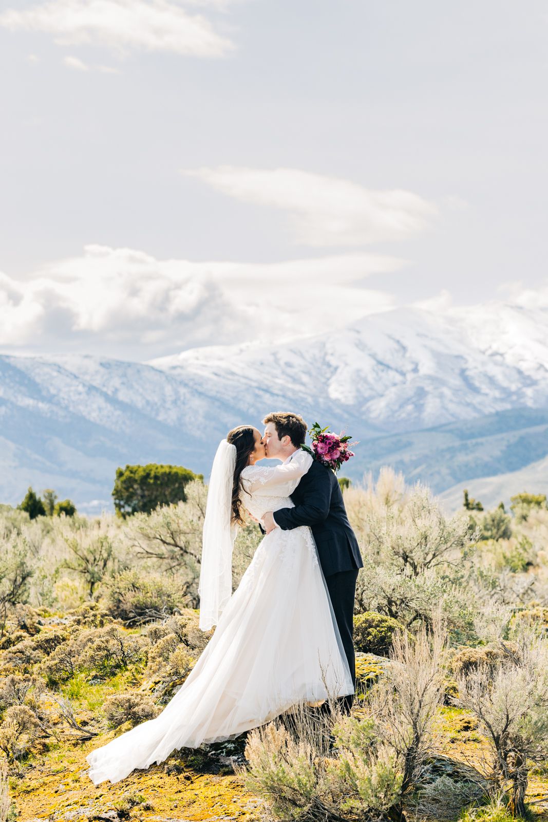 Jackson Hole wedding photographer captures Idaho falls bride and groom kiss at idaho falls wedding