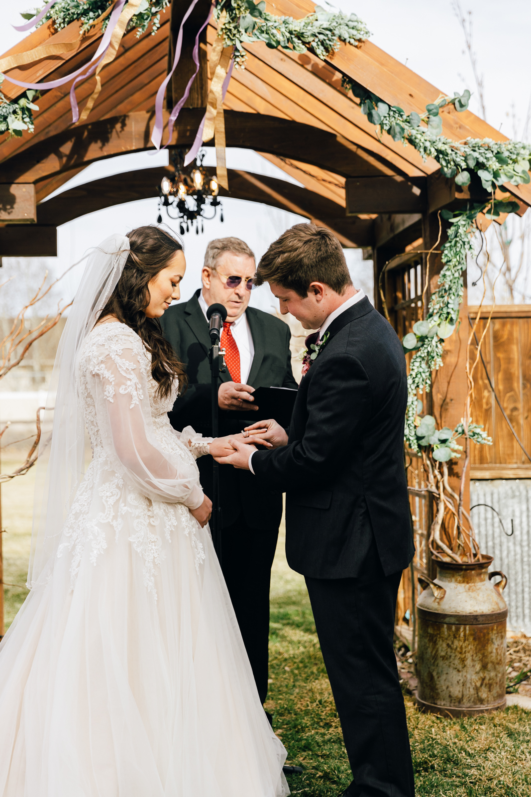 Jackson Hole wedding photographer captures bride and groom during wedding ceremony at the Barn on 1st