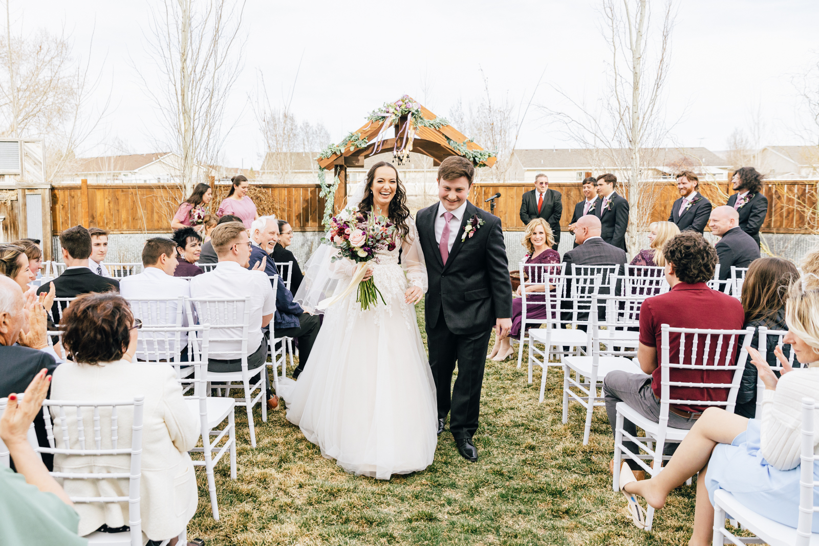 Jackson Hole wedding photographer captures bride and groom leaving together