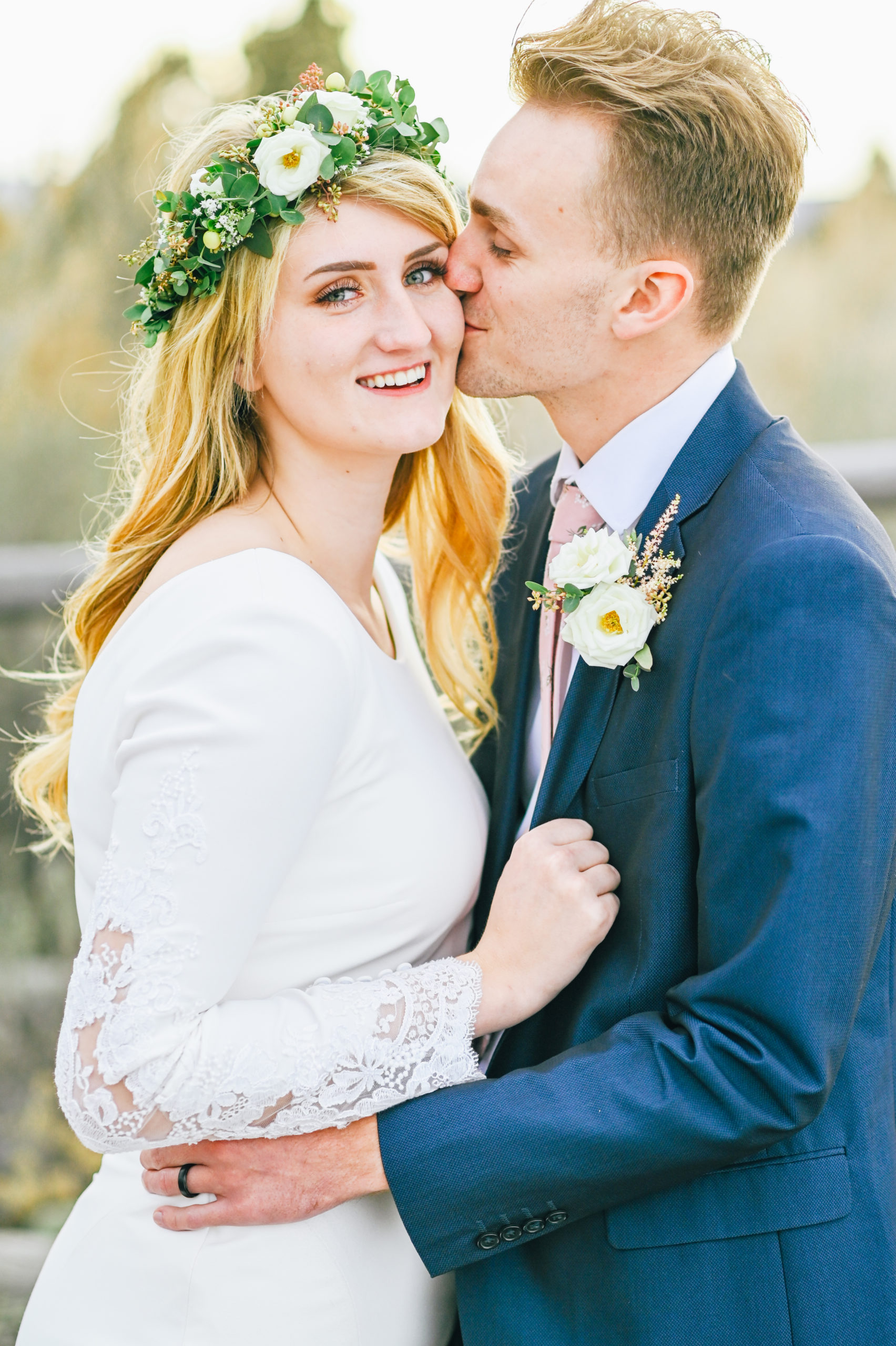 bride smiling with floral crown