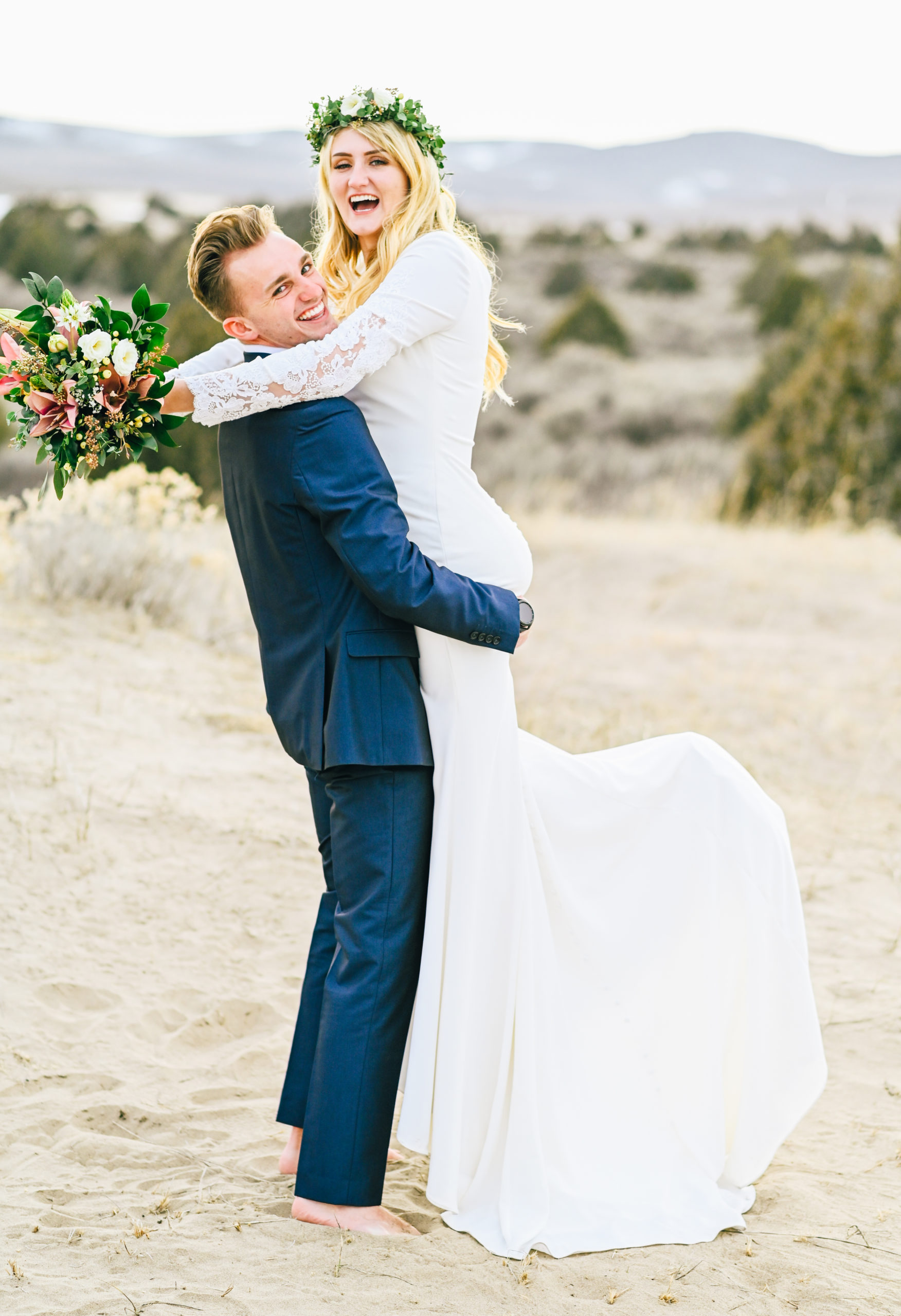 groom lifting bride up and spinning around